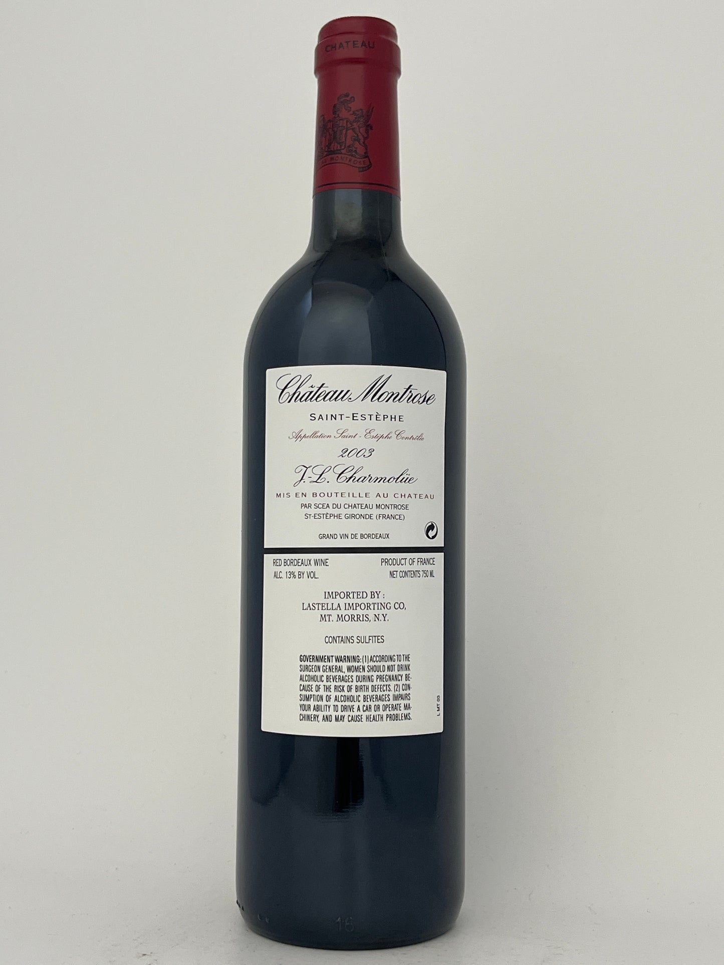 Back label of a bottle of Chateau Montrose, Cabernet Sauvignon, Saint-Estephe, Bordeaux, France 2003 in a white backround.