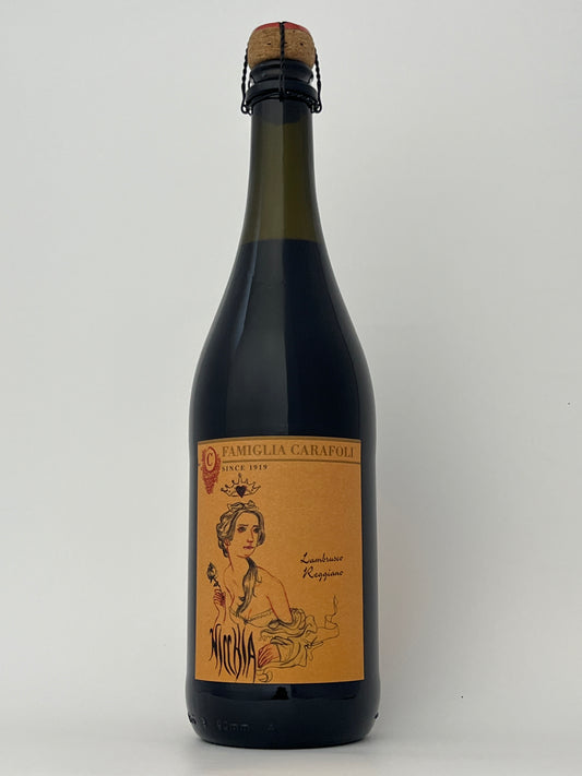 Bottle of Familia Carafoli, Lambrusco di Modena, "Nicchia," Emilia-Romagna, Italy NV in a white backround.	