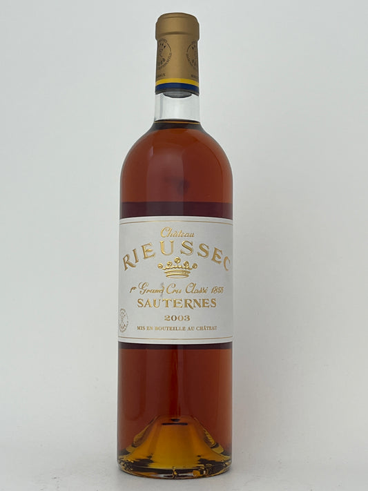 Bottle of Chateau Rieussec, Semillon, Sauternes, Bordeaux, France 2003 in a white backround.	