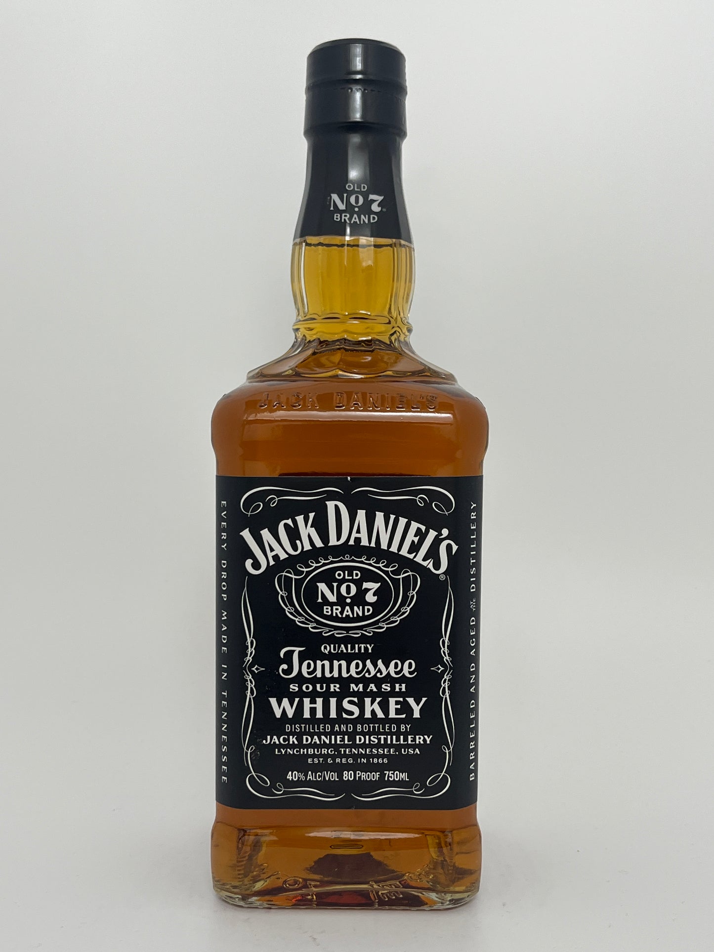 Bottle of Jack Daniel's Old No 7 Tennessee Whiskey in a white backround. 