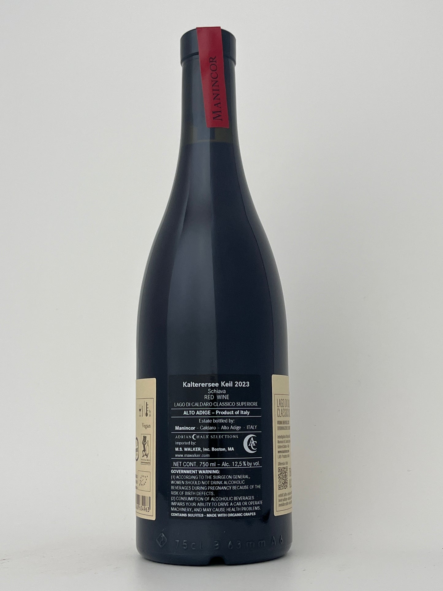 Back label of a bottle of Manincor, Schiava, "Del Keil," Trentino-Alto Adige, Italy 2023 in a white backround.