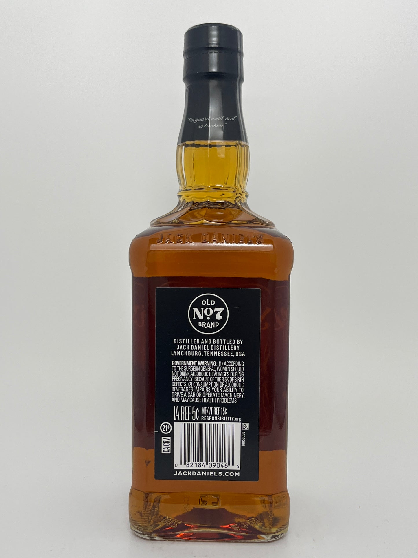 Back label of Jack Daniel's Old No 7 Tennessee Whiskey in a white backround. 