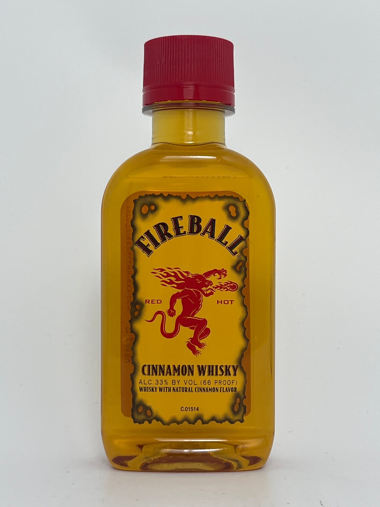 Bottle of Fireball Cinnamon Whisky (100 ml) in a white backround
