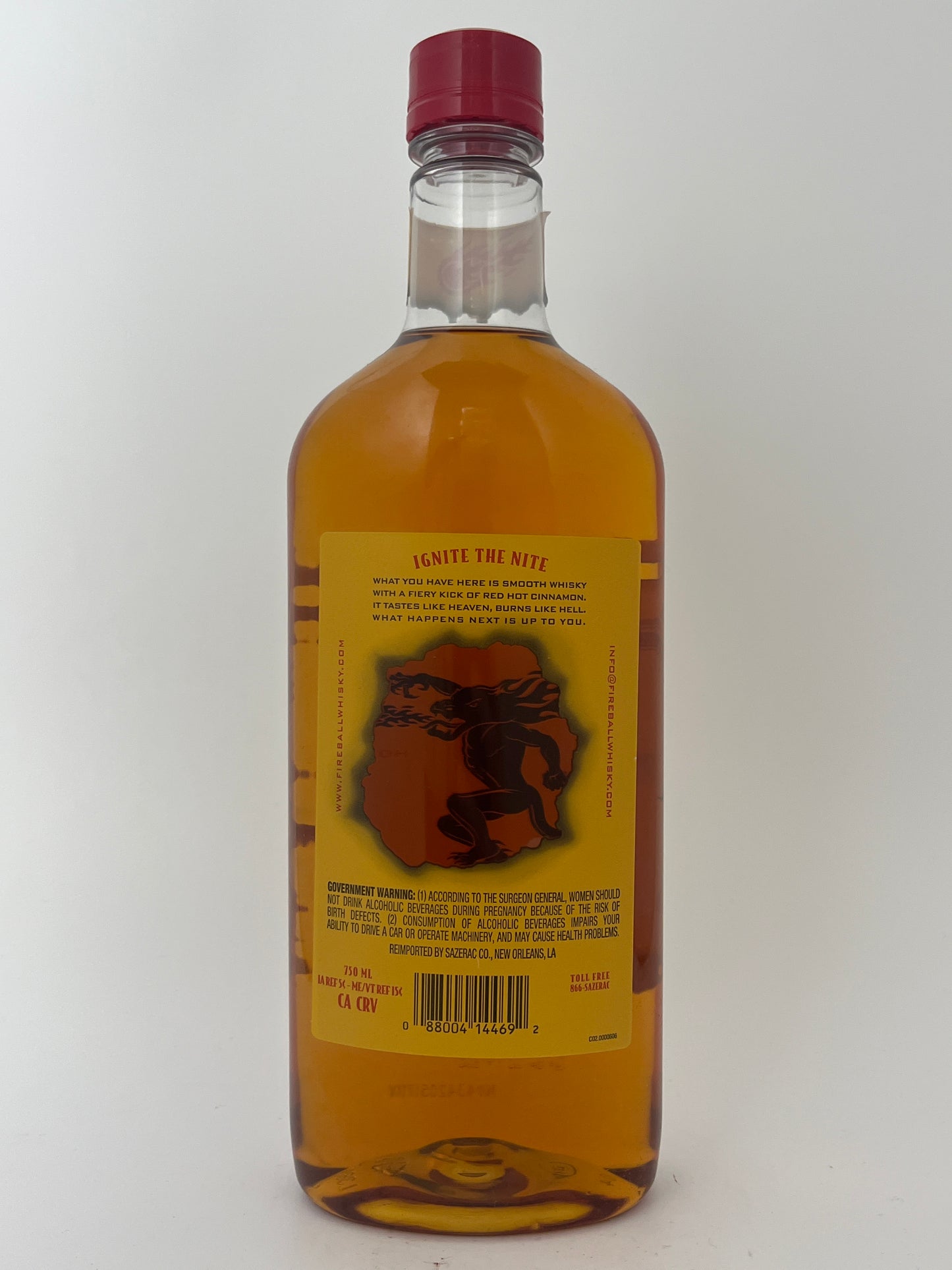 Back label of a bottle of Fireball Cinnamon Whisky in a white backround.