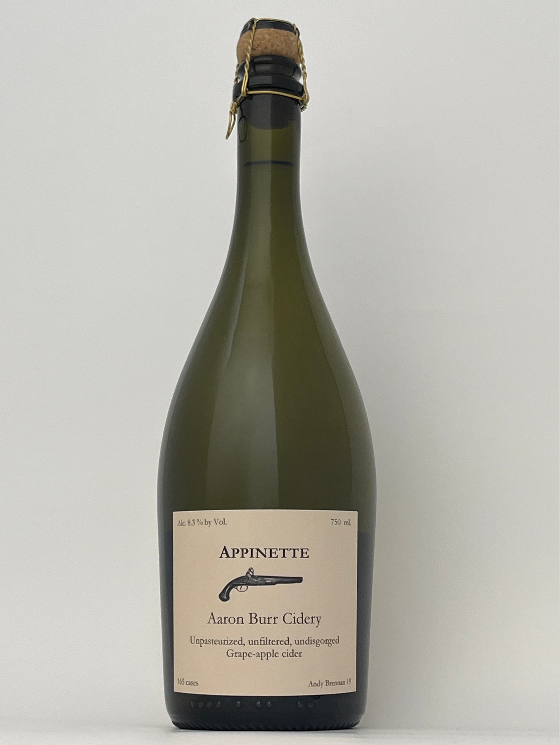 Bottle of Aaron Burr Cidery "Appinette"  in a white backround.	
