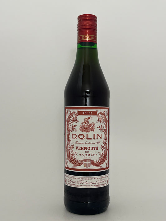 Bottle of Dolin Sweet Vermouth de Chambery in a white backround.