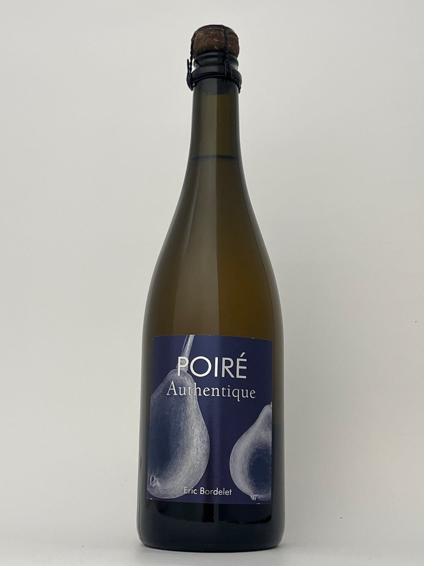 Bottle of Bordelet Authentique Poire in a white backround.	