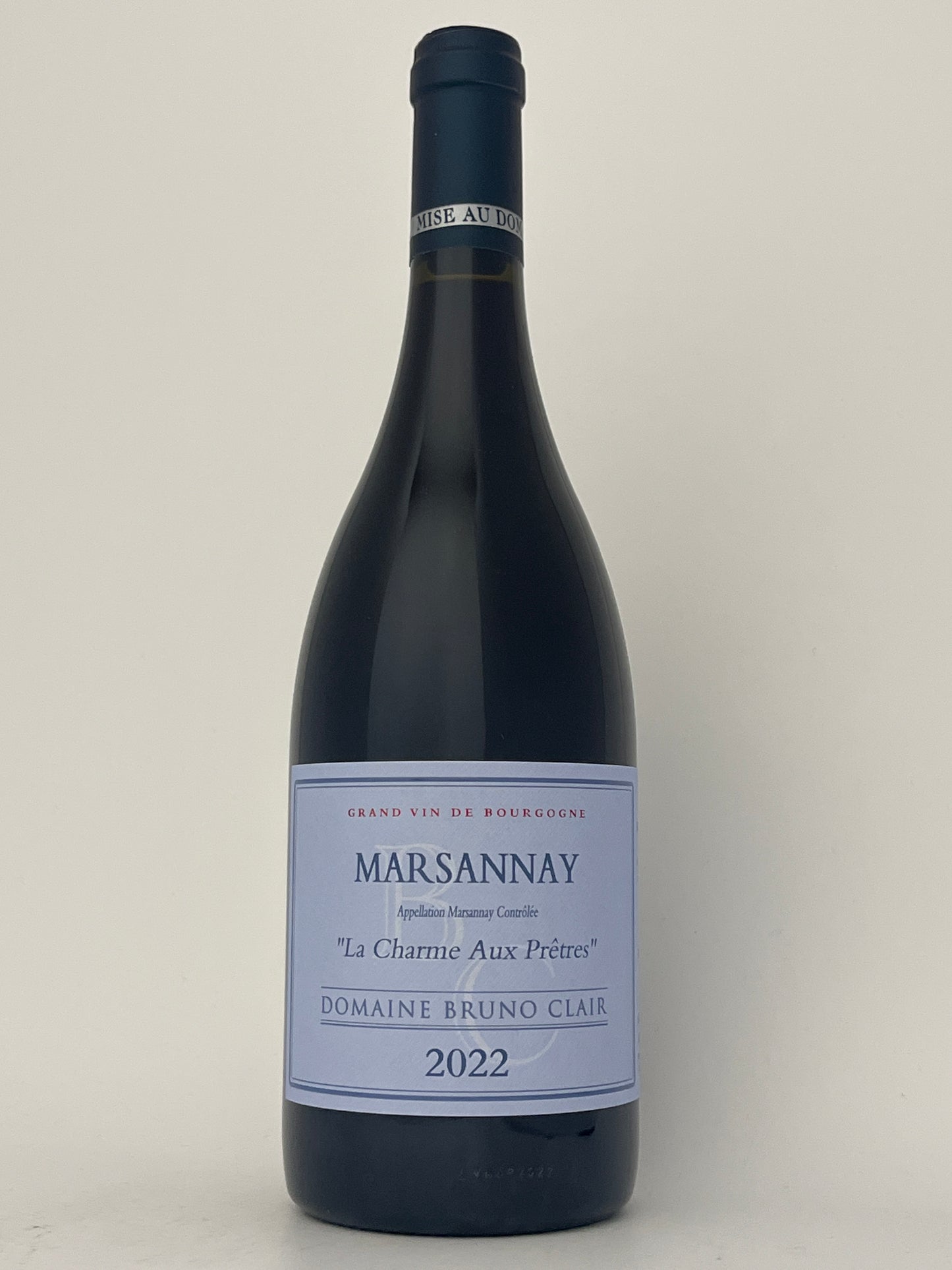 Bottle of Domaine Bruno Clair, Pinot Noir, "La Charme Aux Pretres," Marsannay, Burgundy, France 2022 in a white backround.	