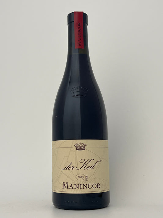 Bottle of Manincor, Schiava, "Del Keil," Trentino-Alto Adige, Italy 2023 in a white backround.	