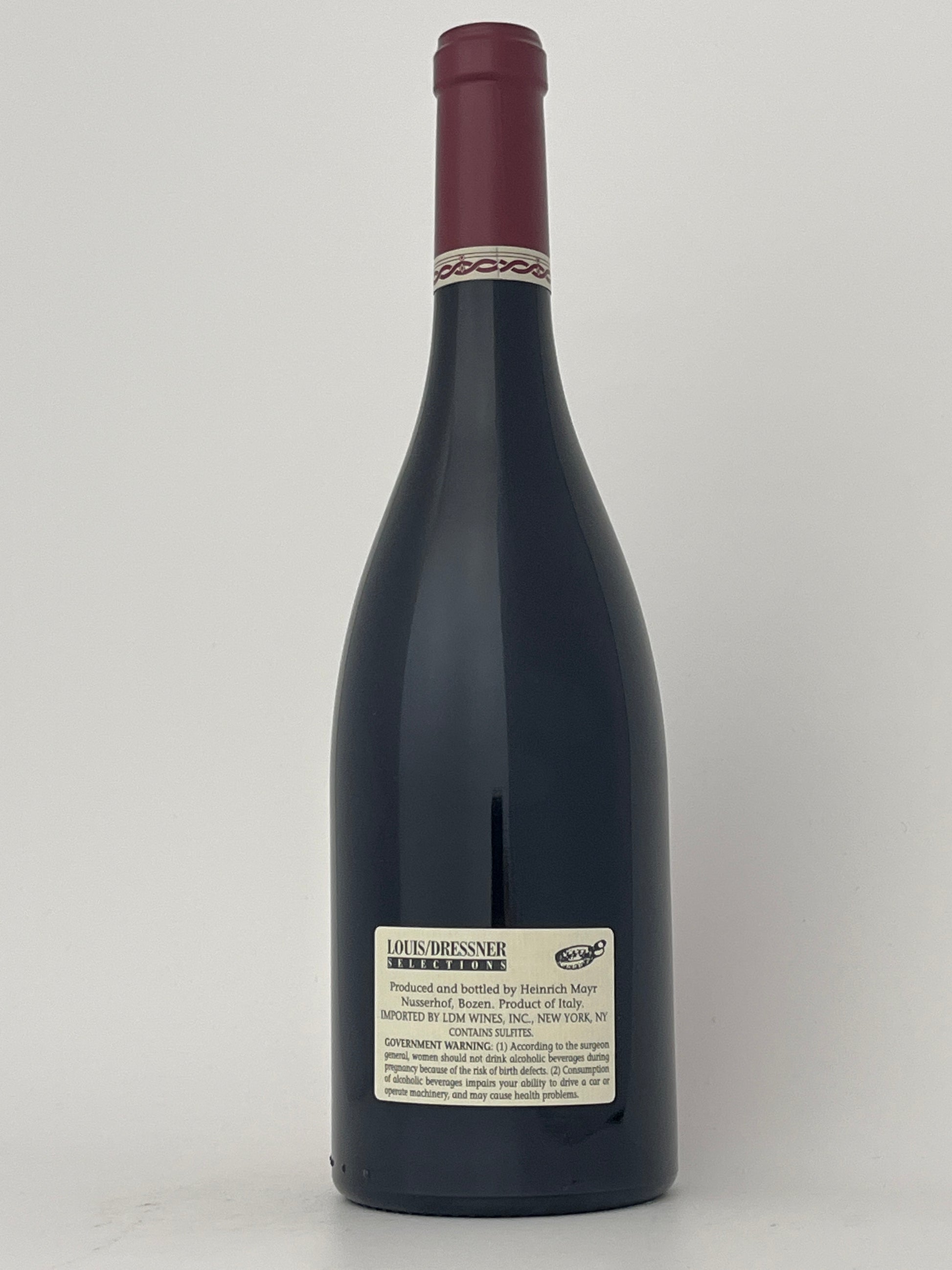 Back label of a bottle of Nusserhof, Teroldego, Vigneti delle Dolomiti, Alto Adige, Italy 2018 in a white backround.