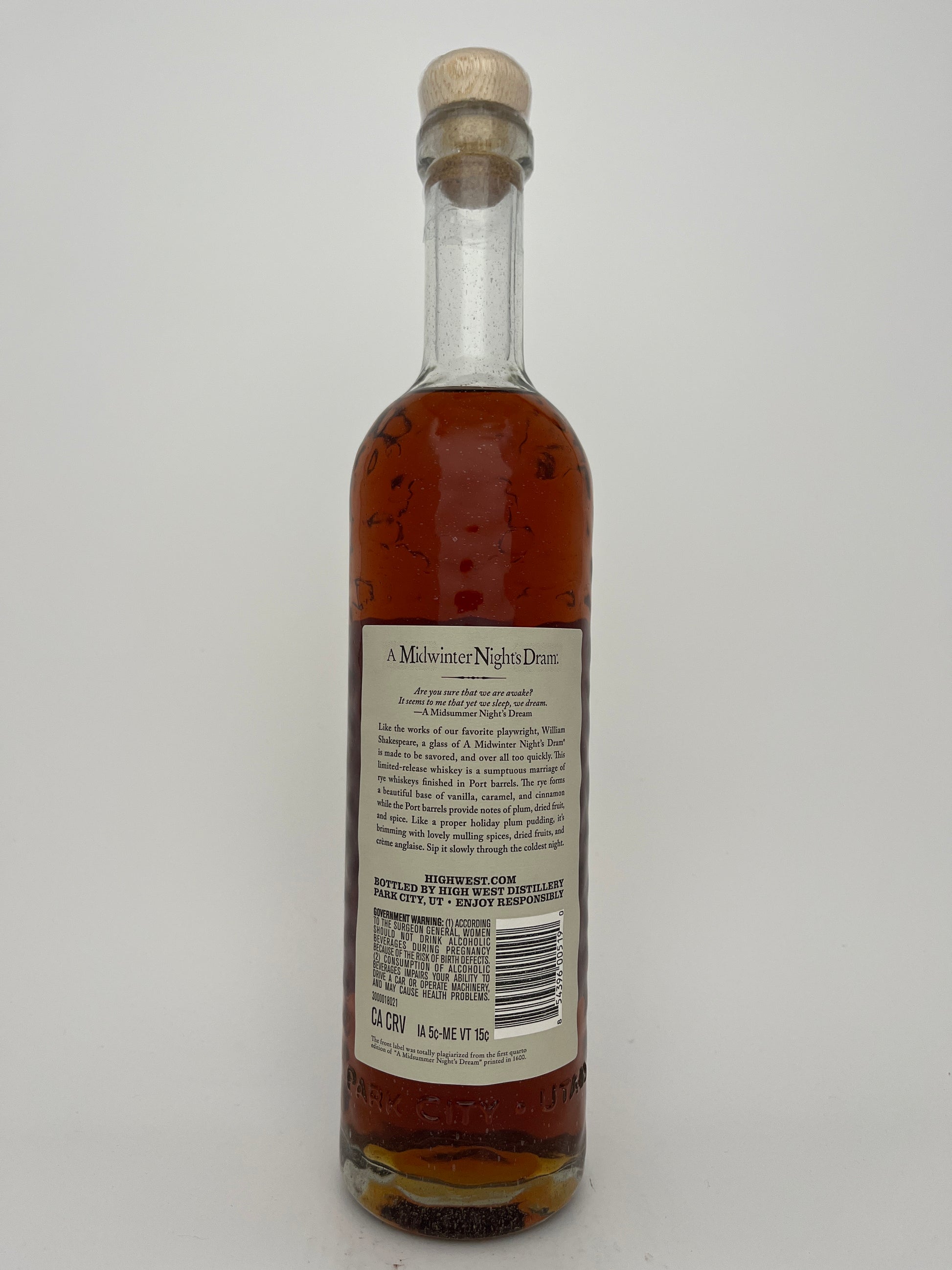 Back label of a bottle of 'A Midwinter Night's Dram' on a white background