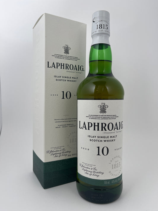 Bottle of Laphroaig Single Malt 10 Year with the original box in a white backround.	Back label of a bottle of Laphroaig Single Malt 10 Year in a white backround.