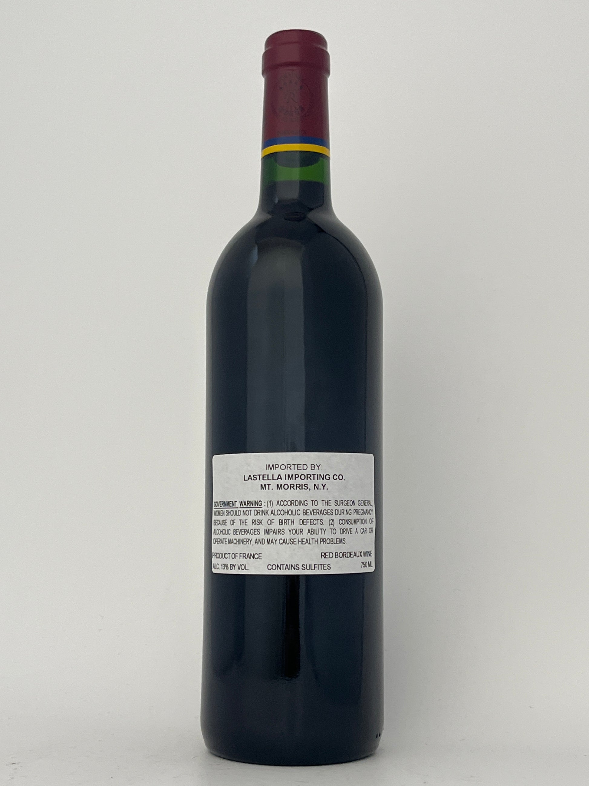Back label of a bottle of Chateau Duhart-Milon, Cabernet Sauvignon, Pauillac, Bordeaux, France 2003 in a white backround.