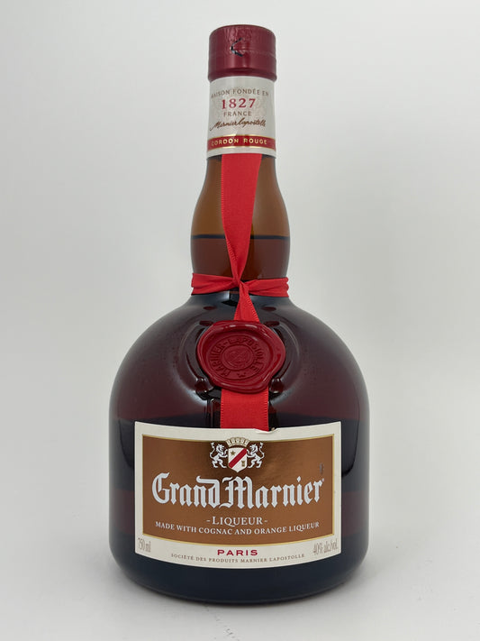 Bottle of Grand Marnier "Gordon Rouge" in a white backround.