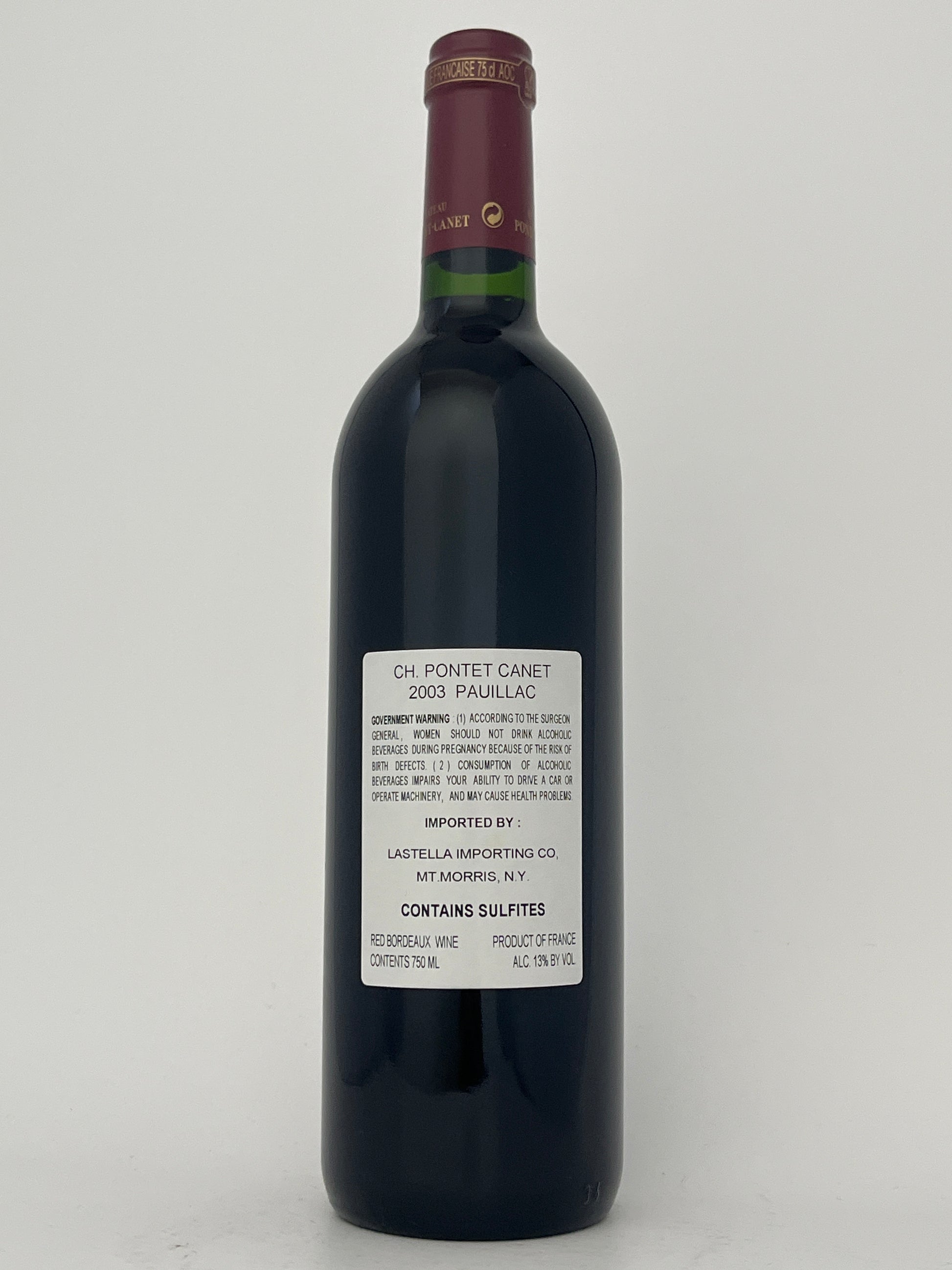 Back label of a bottle of Chateau Pontet-Canet, Cabernet Sauvignon, Pauillac, Bordeaux, France 2003 in a white backround.