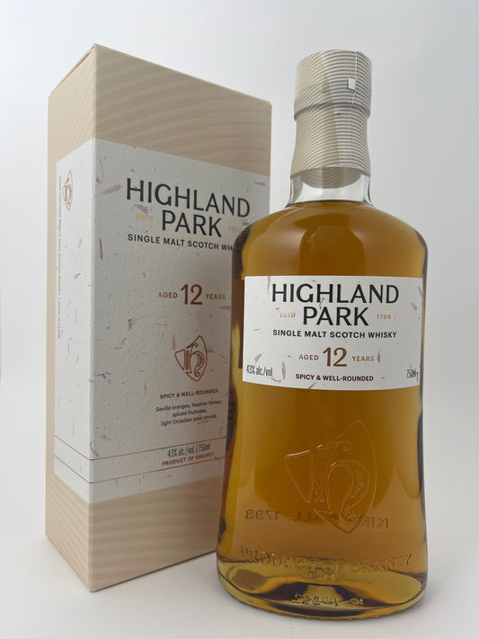 Bottle of Highland Park 12 Year with the original box in a white backround.