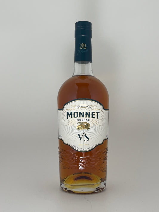Bottle of Monnet VS Cognac on a white backround. 