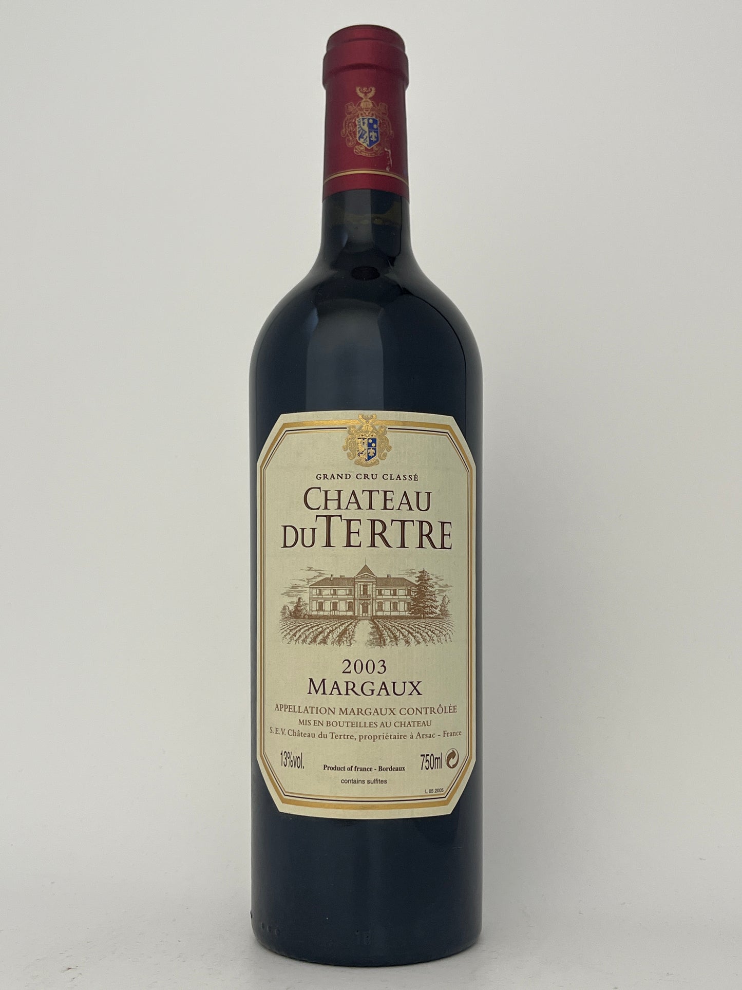 Bottle of Chateau du Tertre, Cabernet Sauvignon, Margaux, Bordeaux, France 2003 in a white backround.	