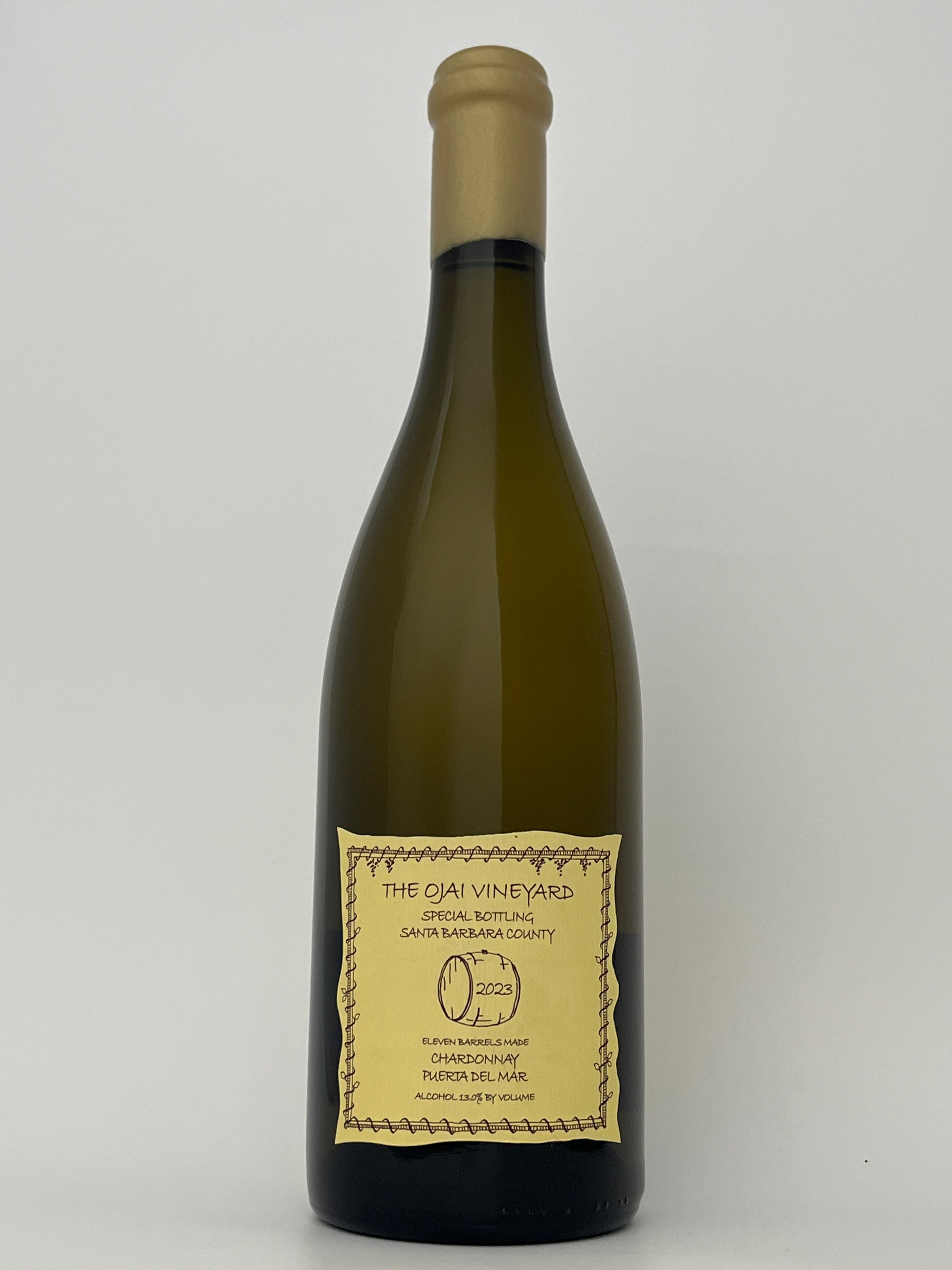Bottle of Ojai, Chardonnay, "Puerta del Mar," California 2023 in a white backround.	