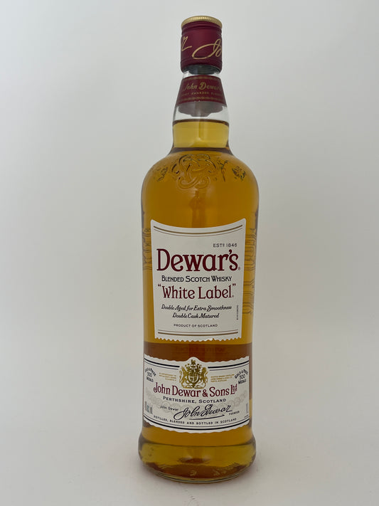 Bottle of Dewar's White Label Whiskey on a white backround. 