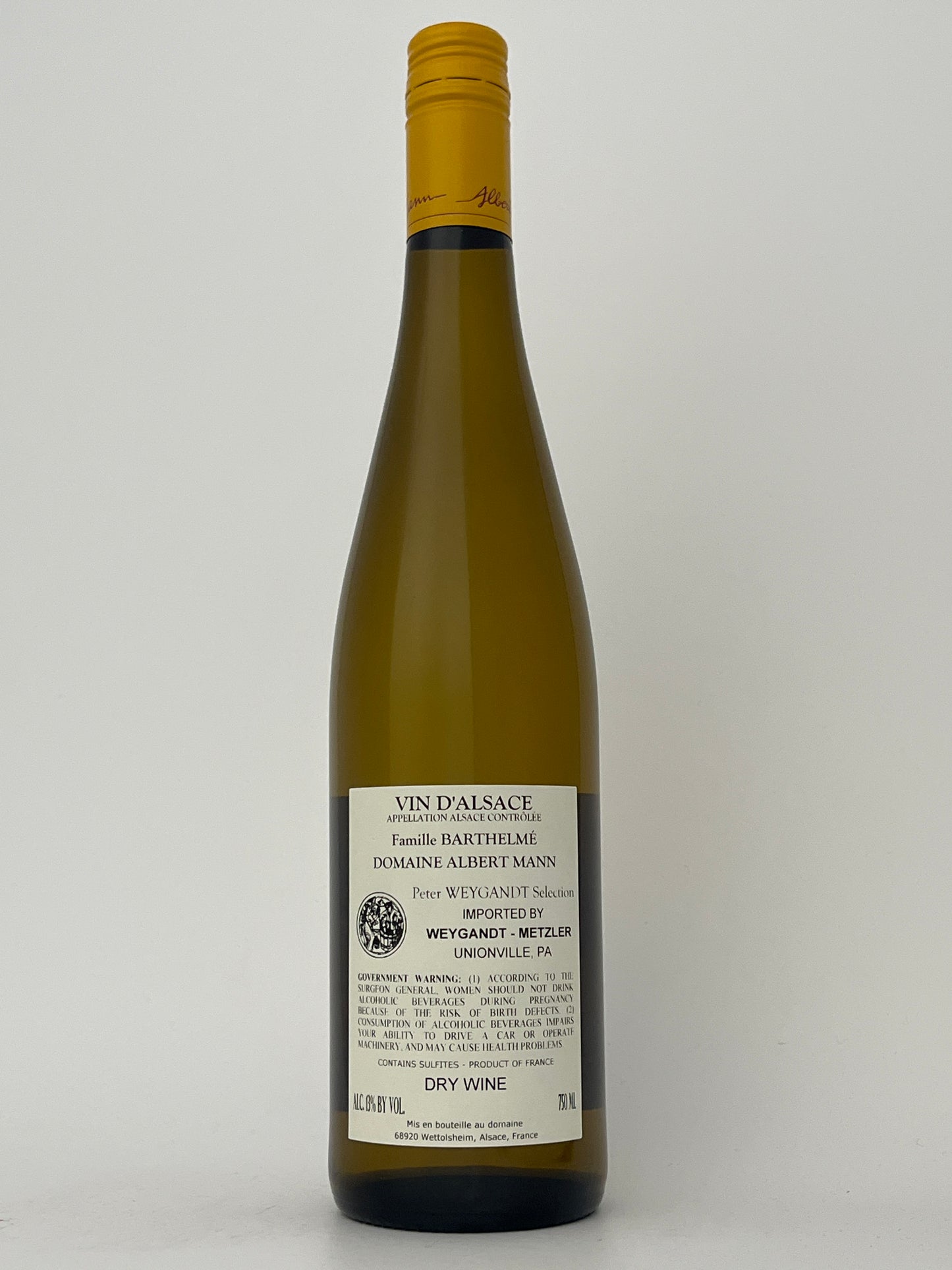Back label of a bottle of Albert Mann, Pinot Gris, Alsace, France 2024 in a white backround.