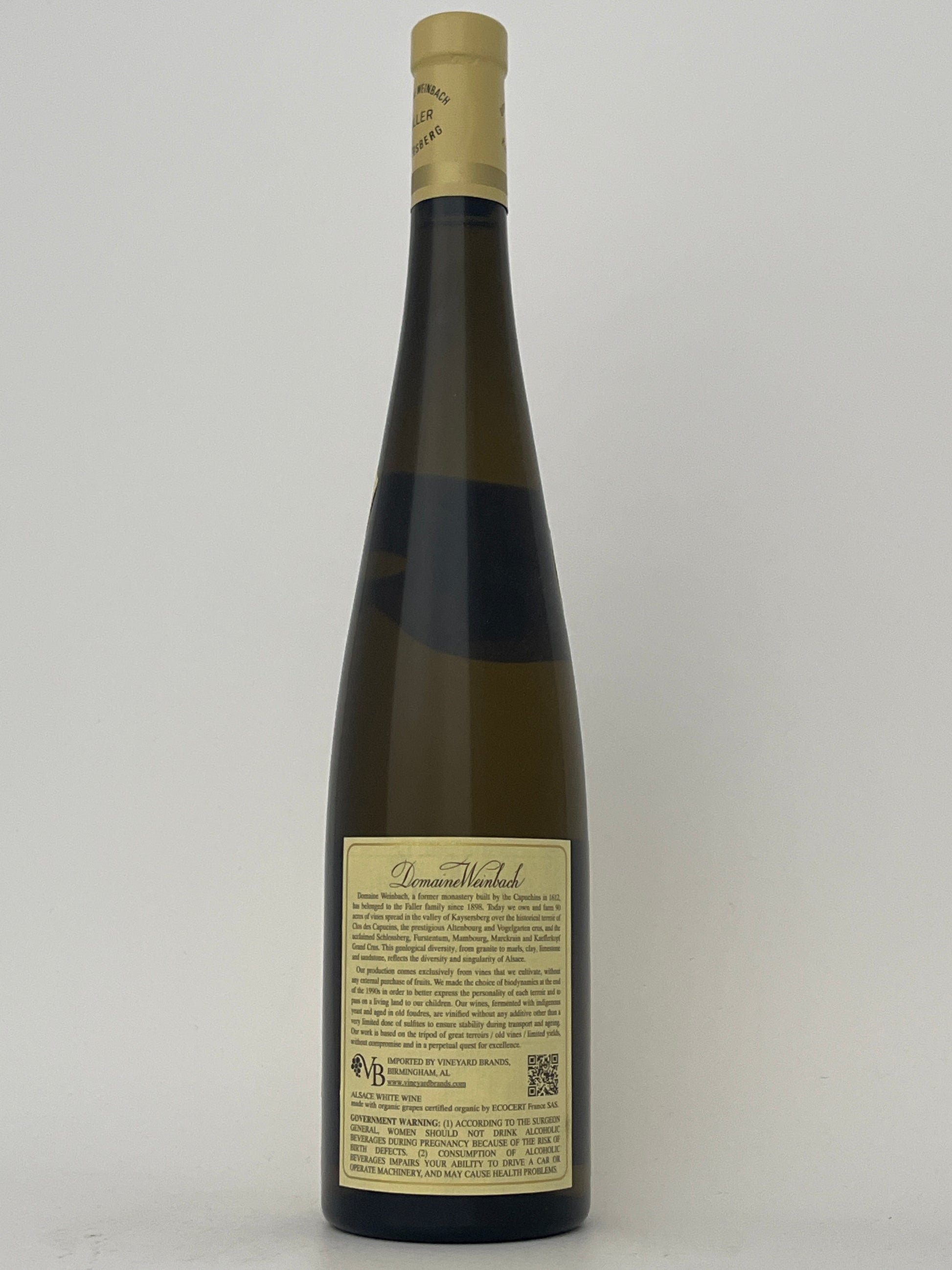 Back label of a bottle of Weinbach, Riesling, Alsace, France 2020 in a white backround.