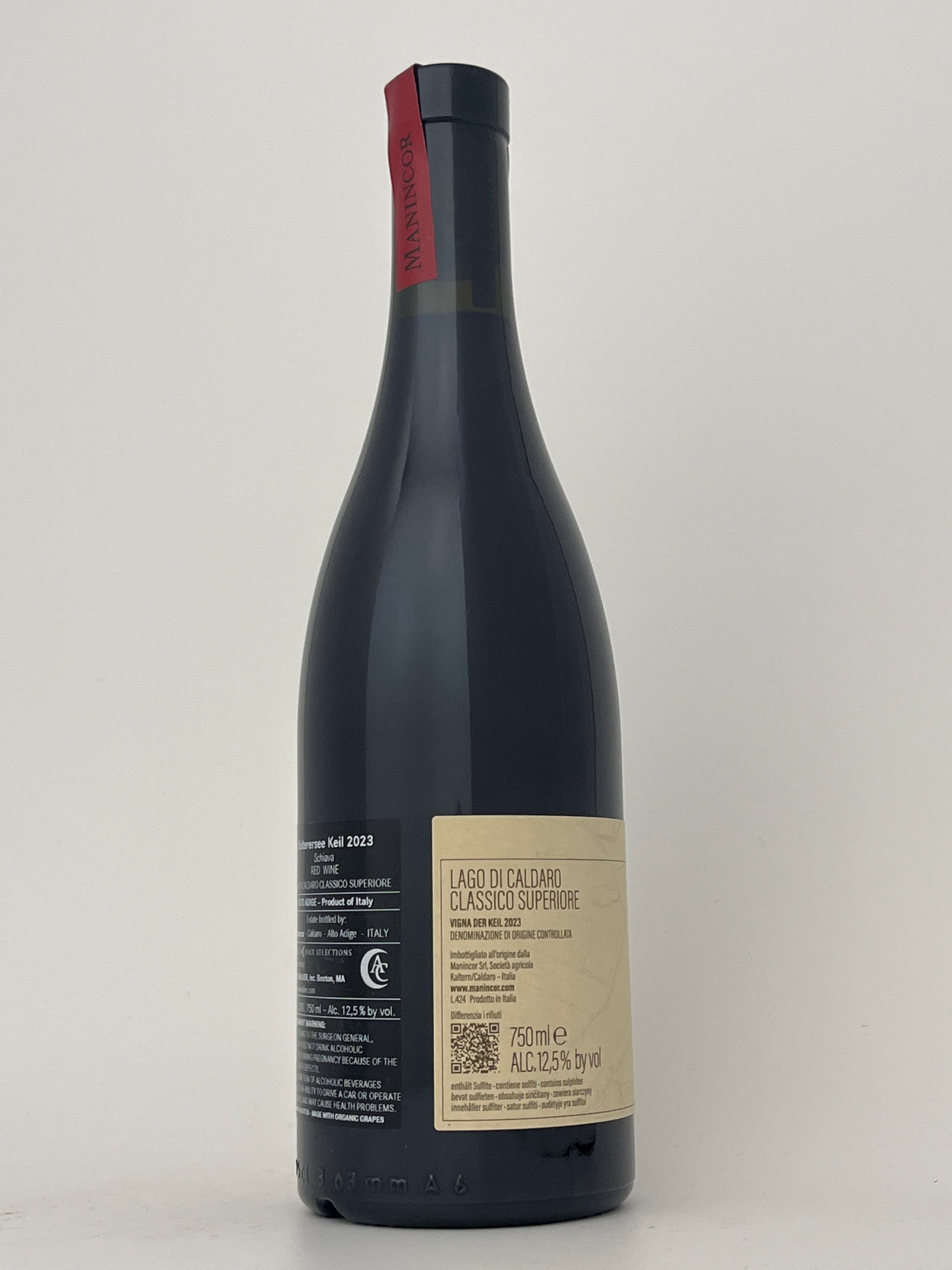 Side label of a bottle of Manincor, Schiava, "Del Keil," Trentino-Alto Adige, Italy 2023 in a white backround.