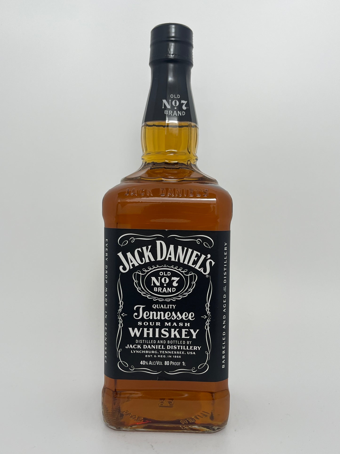 1 L Bottle of Jack Daniel's Old No 7 Tennessee Whiskey in a white backround. 