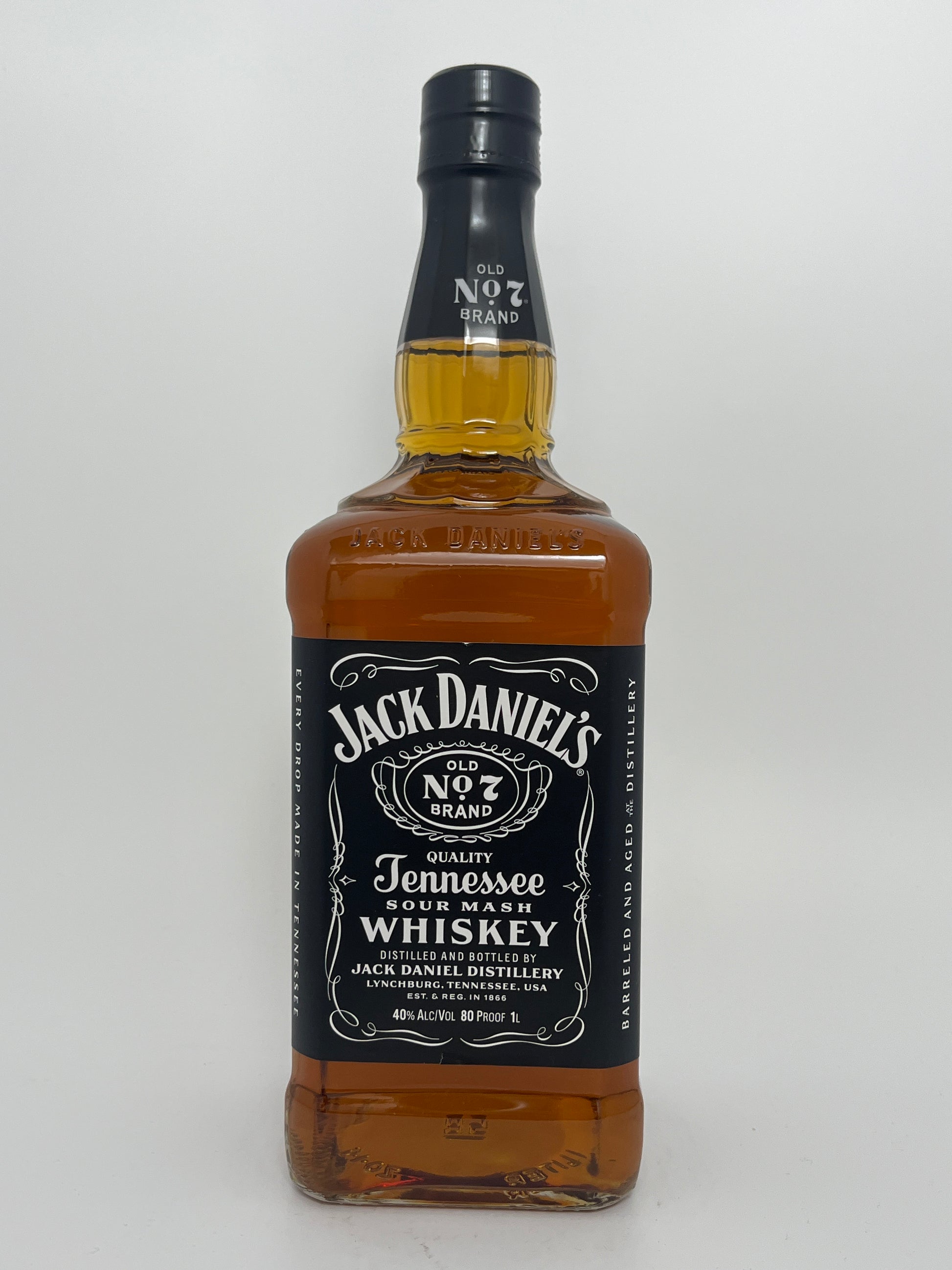 1 L Bottle of Jack Daniel's Old No 7 Tennessee Whiskey in a white backround. 