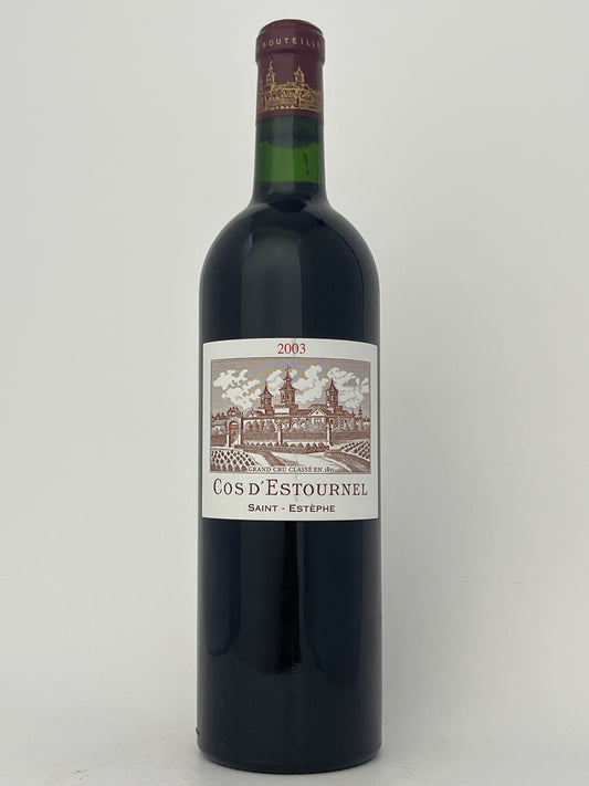 Bottle of Chateau Cos d'Estournel, Cabernet Sauvignon, Saint-Estephe, Bordeaux, France 2003 in a white backround.