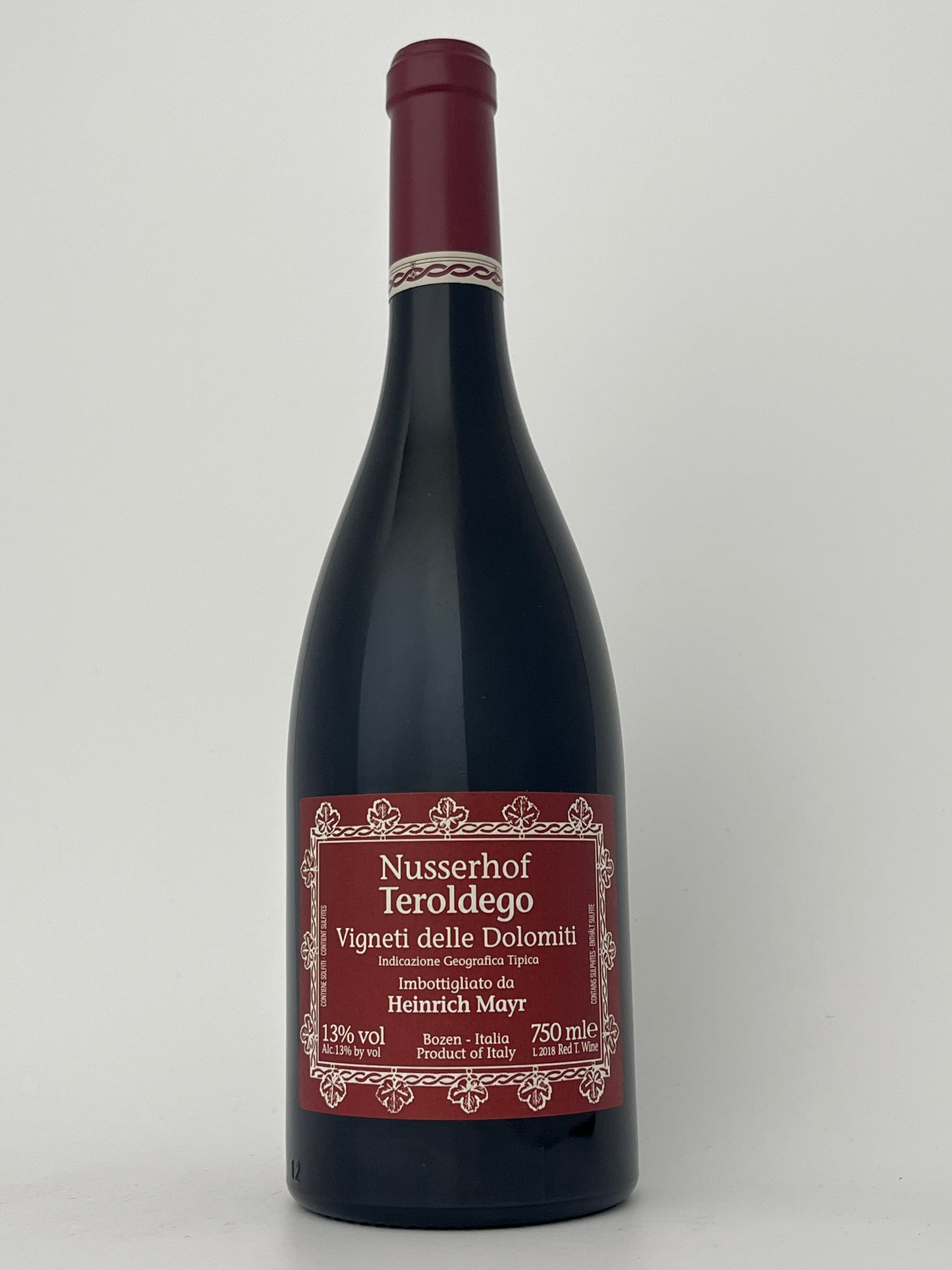 Bottle of Nusserhof, Teroldego, Vigneti delle Dolomiti, Alto Adige, Italy 2018 in a white backround.	