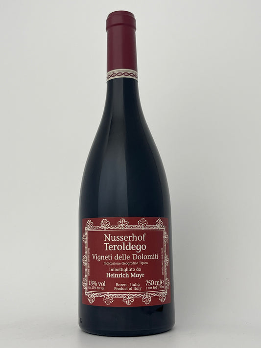 Bottle of Nusserhof, Teroldego, Vigneti delle Dolomiti, Alto Adige, Italy 2018 in a white backround.	