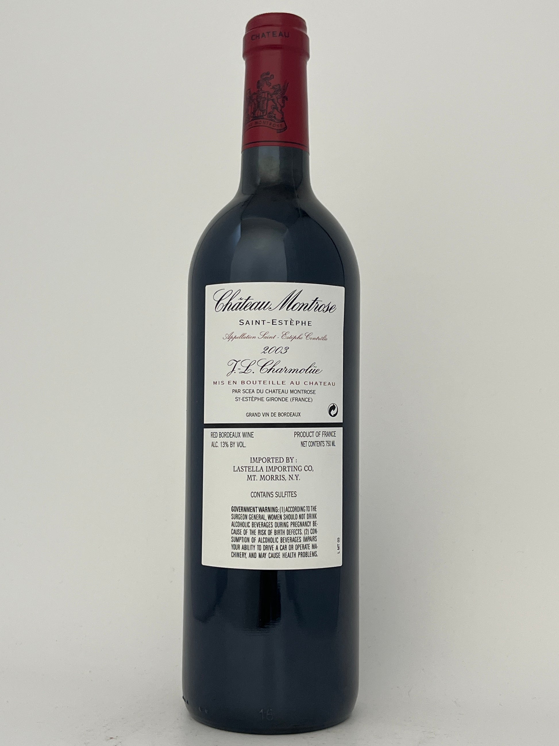 Back label of a bottle of Chateau Montrose, Cabernet Sauvignon, Saint-Estephe, Bordeaux, France 2003 in a white backround.