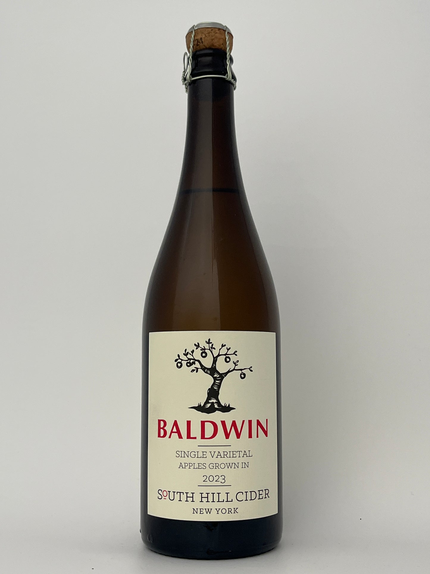 Bottle of South Hill Cider Baldwin in a white backround.